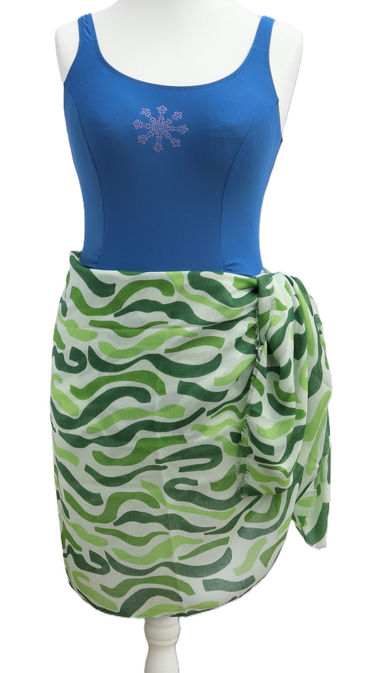 Green and white patterned sarong wrapped around the waist. Sheer, lightweight fabric with flowing, abstract stripes in various green tones.
