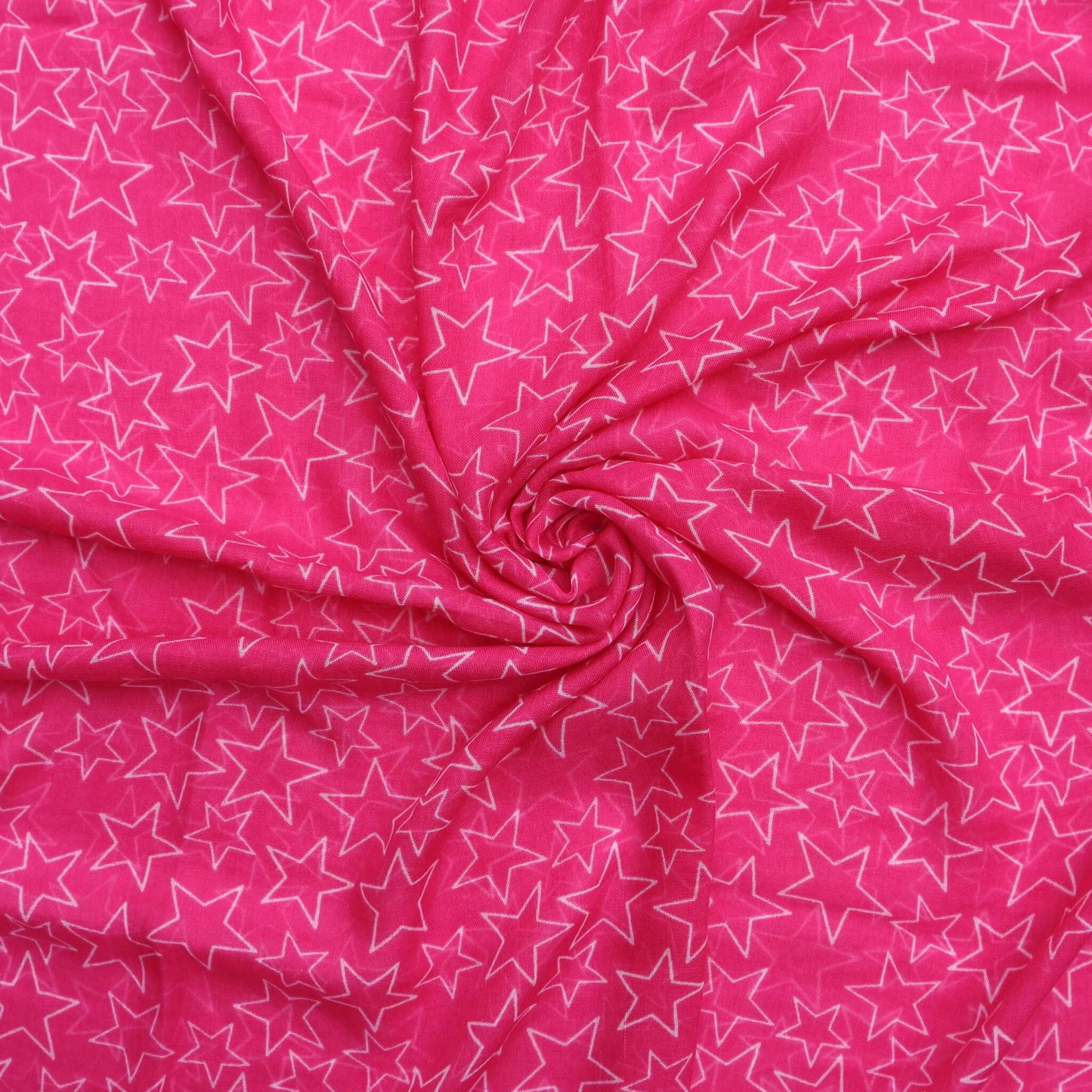 Aurora's Array: Close-up of a soft, lightweight bright pink scarf with a subtle white star print, swirled to show detail.