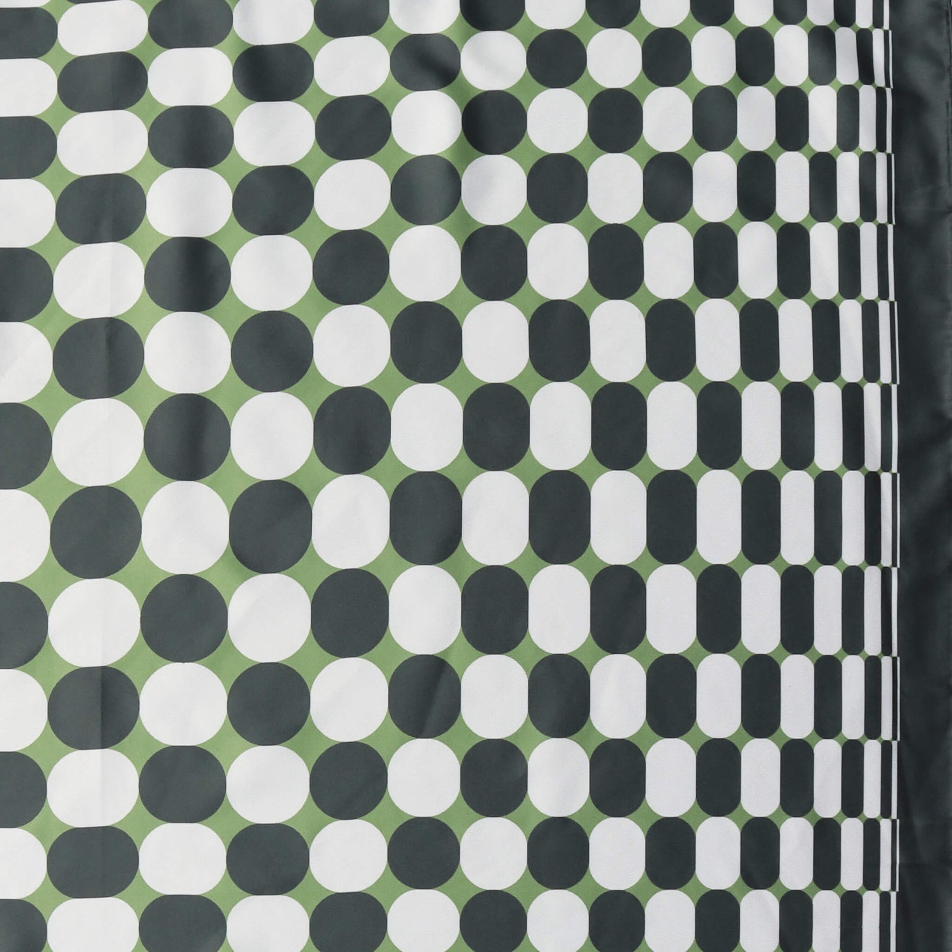 Aurora's Array: Close-up of a small square satin scarf with a geometric pattern of white dots on a dark green background, featuring a border design of clustered white dots on the right edge.