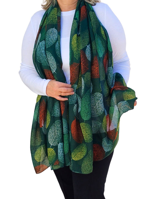 Green-Scarf-with-autumn-leaves-print-on-a-model