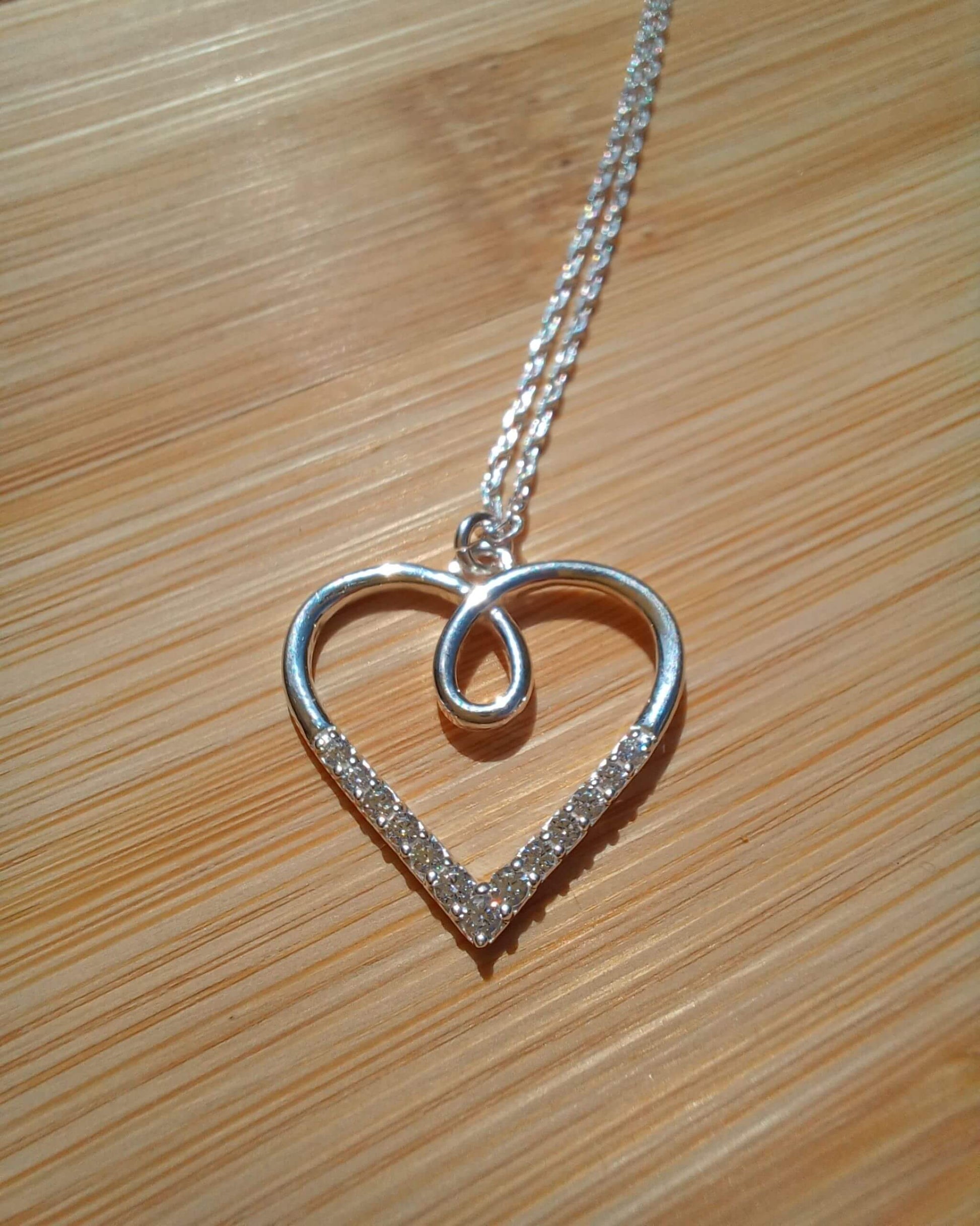 925 Sterling Silver Necklace with an Outline Looped Heart Pendant with Cubic Zirconia Stones - 925-sterling-silver-necklace-with-an-outline-looped-heart-pendant-with-cubic-zirconia-stones-Silver