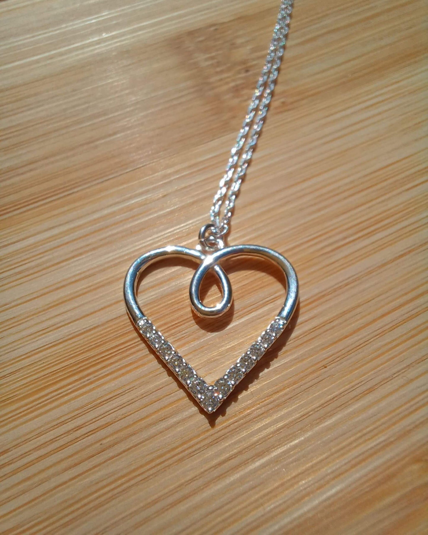 925 Sterling Silver Necklace with an Outline Looped Heart Pendant with Cubic Zirconia Stones - 925-sterling-silver-necklace-with-an-outline-looped-heart-pendant-with-cubic-zirconia-stones-Silver
