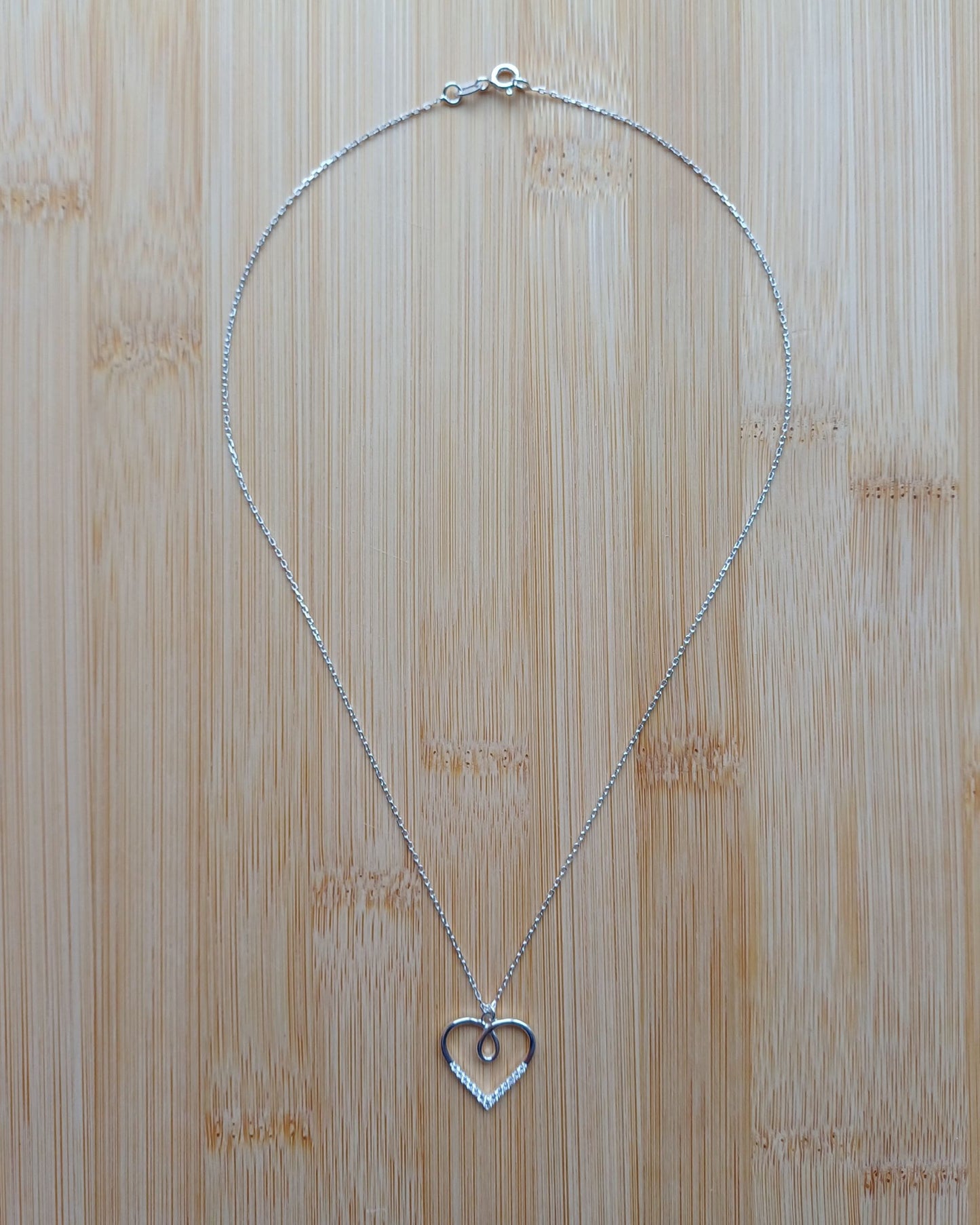 925 Sterling Silver Necklace with an Outline Looped Heart Pendant with Cubic Zirconia Stones - 925-sterling-silver-necklace-with-an-outline-looped-heart-pendant-with-cubic-zirconia-stones-Silver