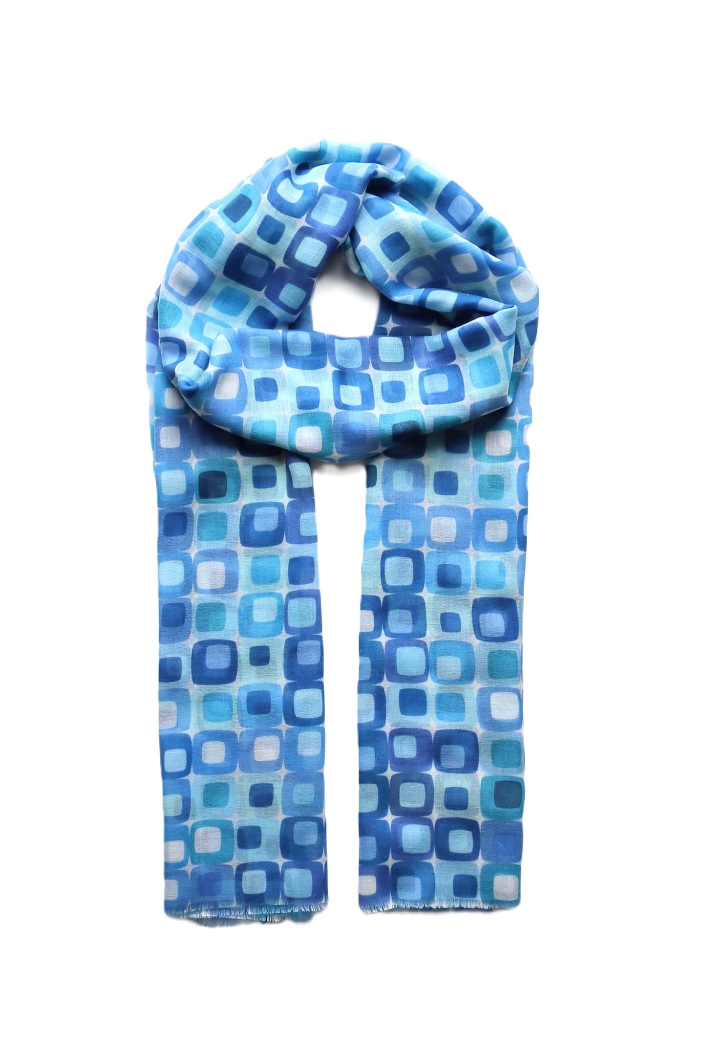 Vibrant blue summer scarf with a geometric square pattern in varying shades of blue and white. Super soft and lightweight wrap.