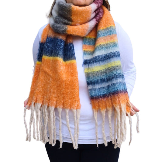 Aurora's Array: Large, fluffy scarf with a striped pattern in orange, burgundy, and blue tones, finished with tassels.