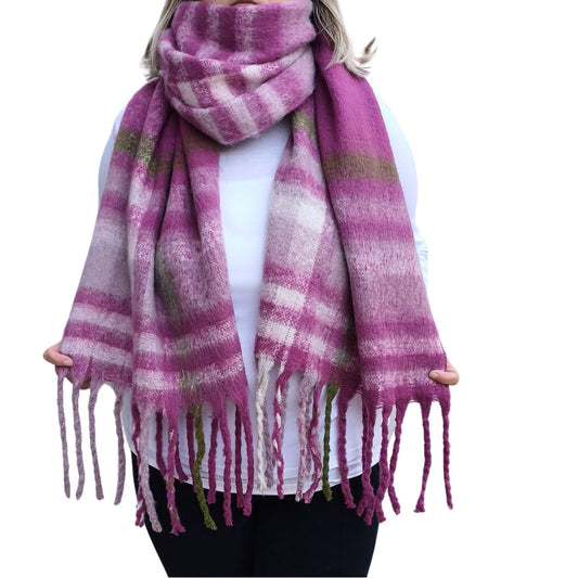 Aurora's Array: Fuchsia Pink Cosy Large Check Blanket Wrap Tassel Scarf. Soft, oversized scarf with a stylish pink, cream, and olive green check pattern and long, twisted tassels. Perfect for adding warmth and a pop of color to any outfit.