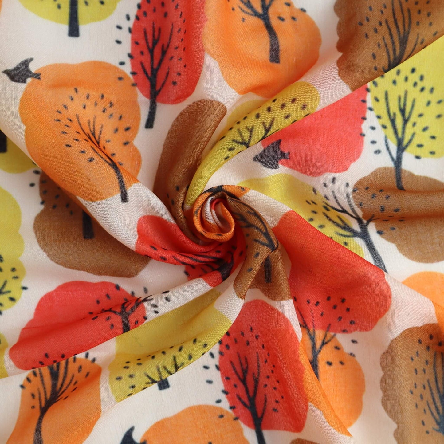 Creamy scarf fabric with an abstract tree design in shades of orange, brown, red, and yellow. Lightweight, flowing textile with a central swirl.