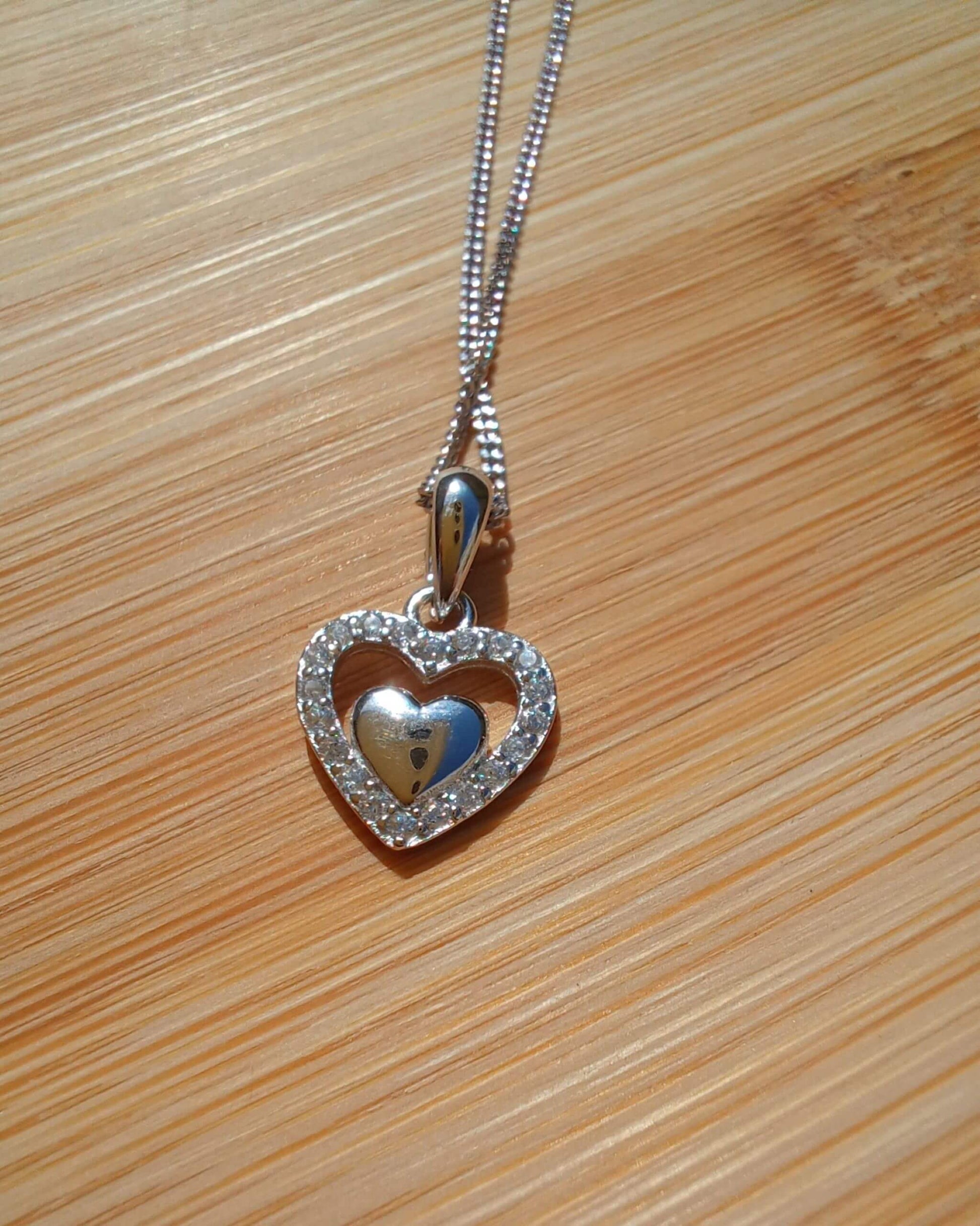 925 Silver Clear Cubic Zirconia Heart Pendant on an 18-inch rhodium-plated Sterling Silver curb chain - silver-clear-cubic-zirconia-heart-pendant-