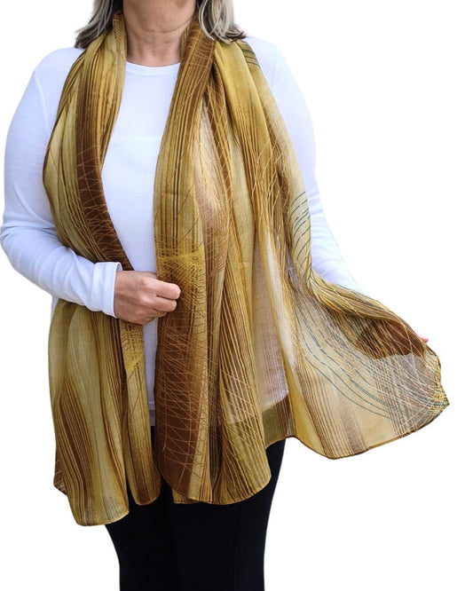 woman wearing tan beige fine stripe print lightweight scarf with soft sheer fabric and natural pattern