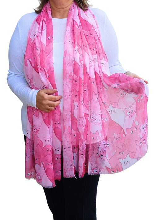Pink scarf with a cute all-over cat pattern in varying shades of pink and white. Soft and lightweight fashion accessory.