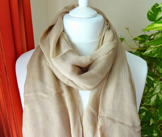 Lightweight oversized scarf in sand beige with frayed hem