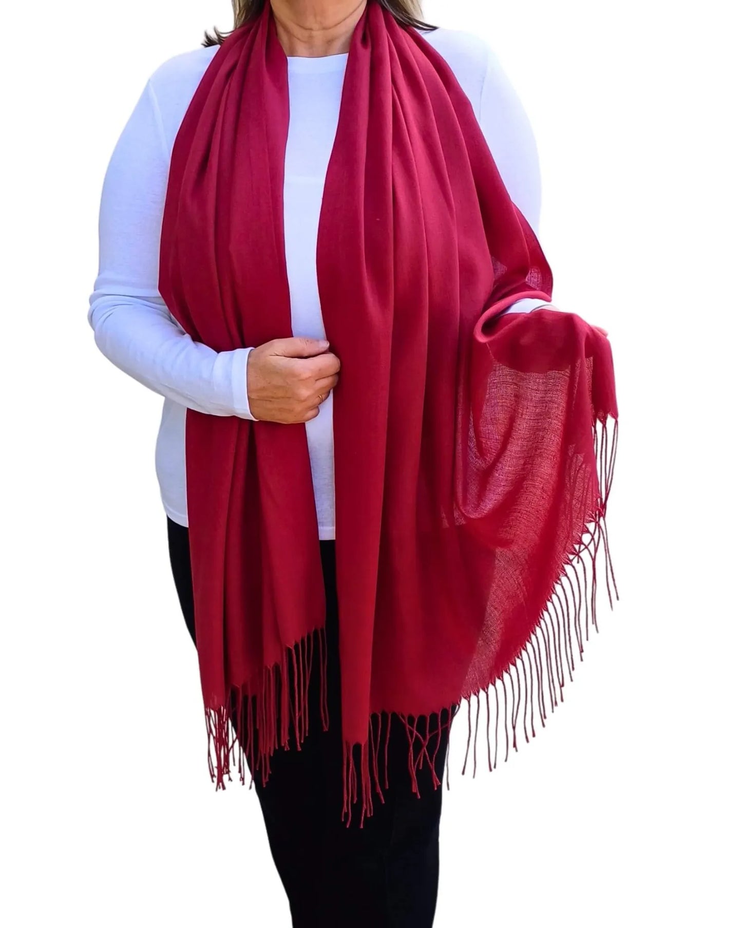 Model wearing dark red pashmina shawl – soft lightweight wrap with tassels, UK brand