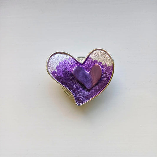 double heart magnetic brooch purple on wooden background