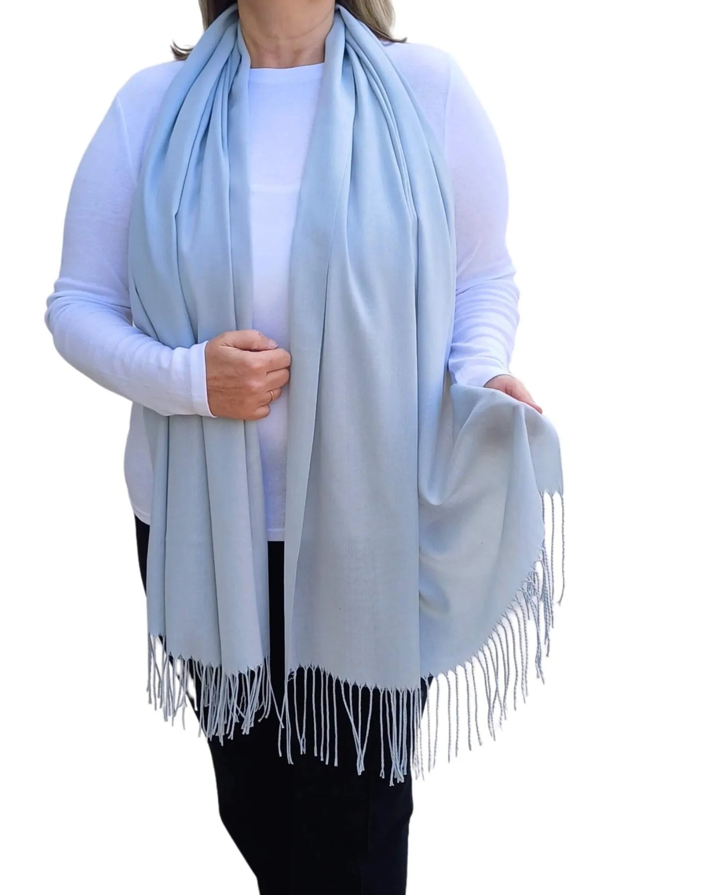 Model wearing light grey pashmina shawl – soft lightweight wrap with tassels, UK brand