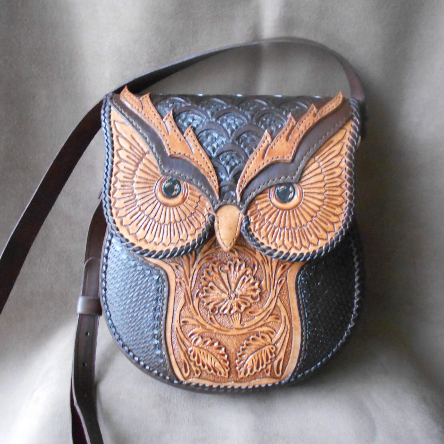 Front view of owl-tooled leather crossbody bag with floral detail – Nox