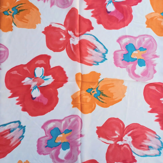 Pink orange floral silky feel square scarf laid open showing pattern