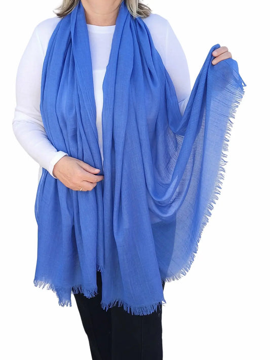 plain cornflower blue soft, cozy large cotton modal scarf shawl, perfect for summer, spring, autumn, winter, worn by a model. - Aurora's Array