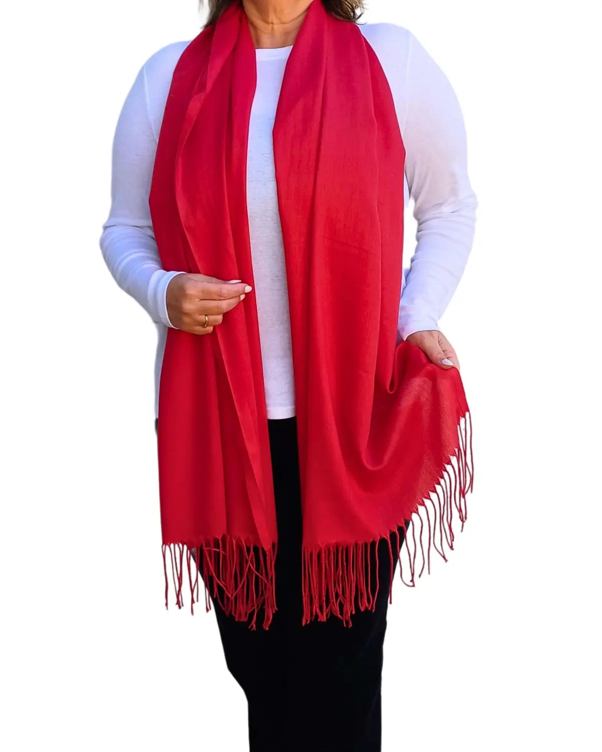 Model wearing red pashmina shawl – soft lightweight wrap with tassels, UK brand