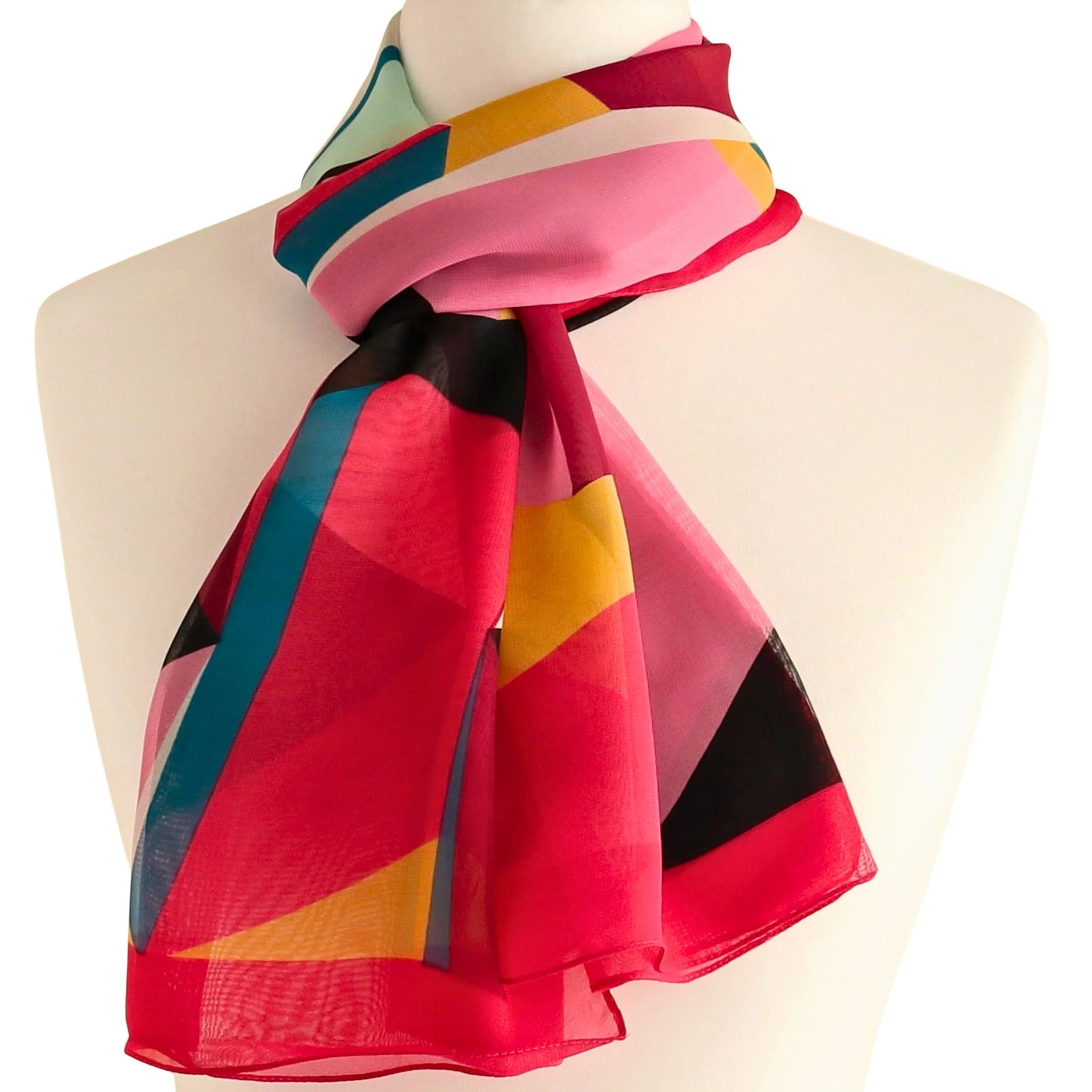Chiffon-style scarf tied at the neck in bold pink, red and yellow retro print