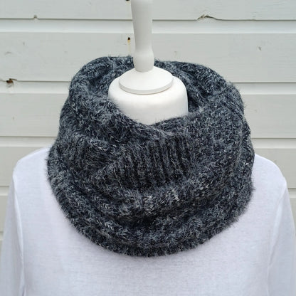 Charcoal grey knitted snood scarf wrapped twice around a mannequin