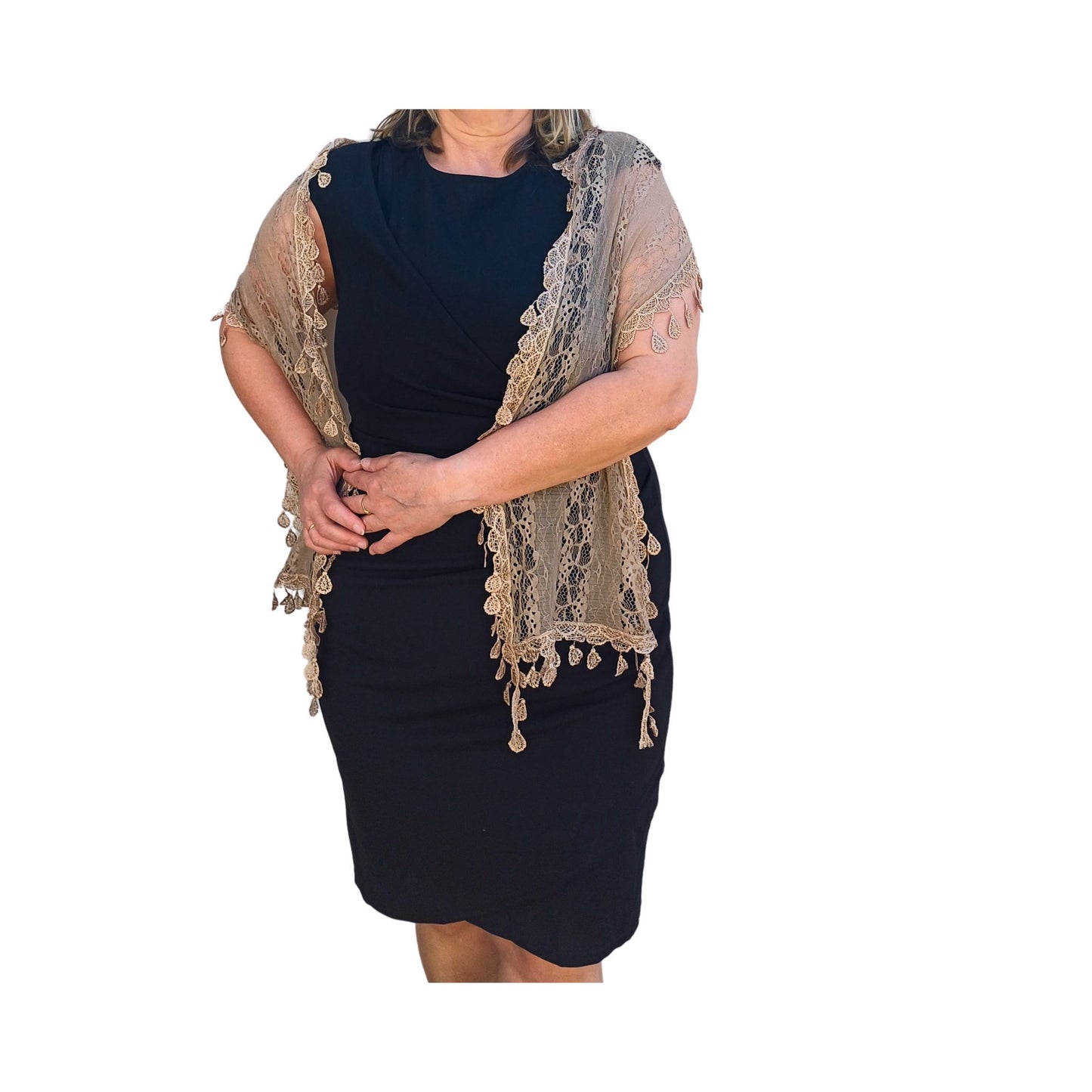 Aurora's Array: Woman models a soft nude beige lace scarf with a delicate leaf-like pattern and fringed edges.