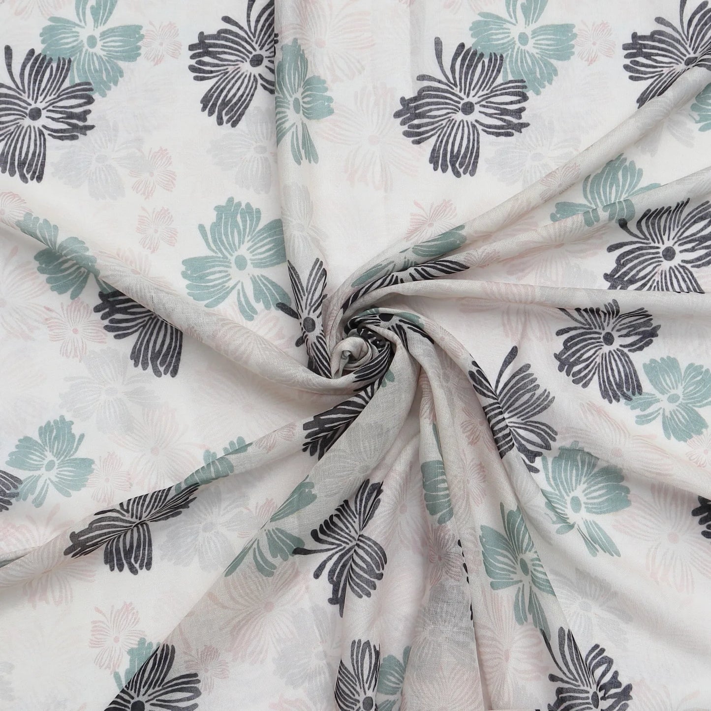 Lightweight pale pink scarf with floral print in black green and soft pink swirled to show texture
