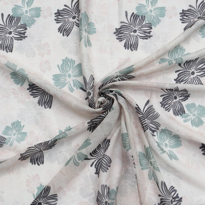 Lightweight pale pink scarf with floral print in black green and soft pink swirled to show texture