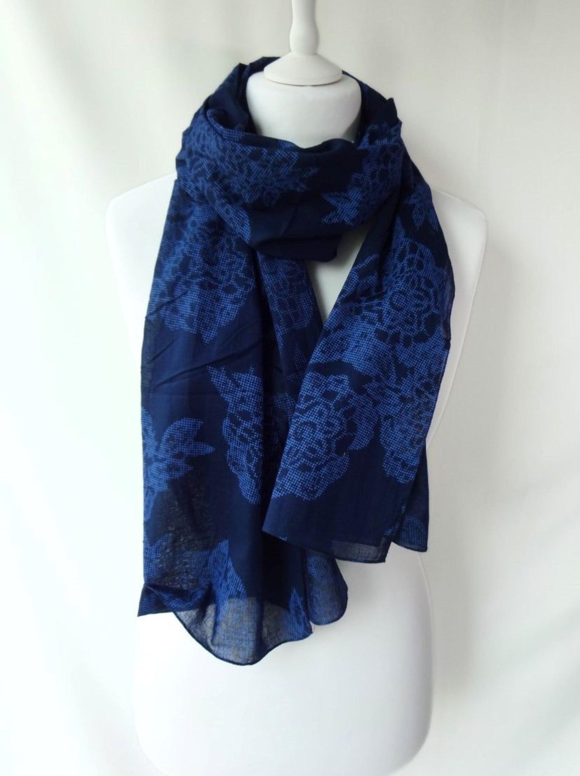 Contemporary-Floral-Design-Blue-Soft-100%-Organic-Cotton-Scarf-on-a-mannequin