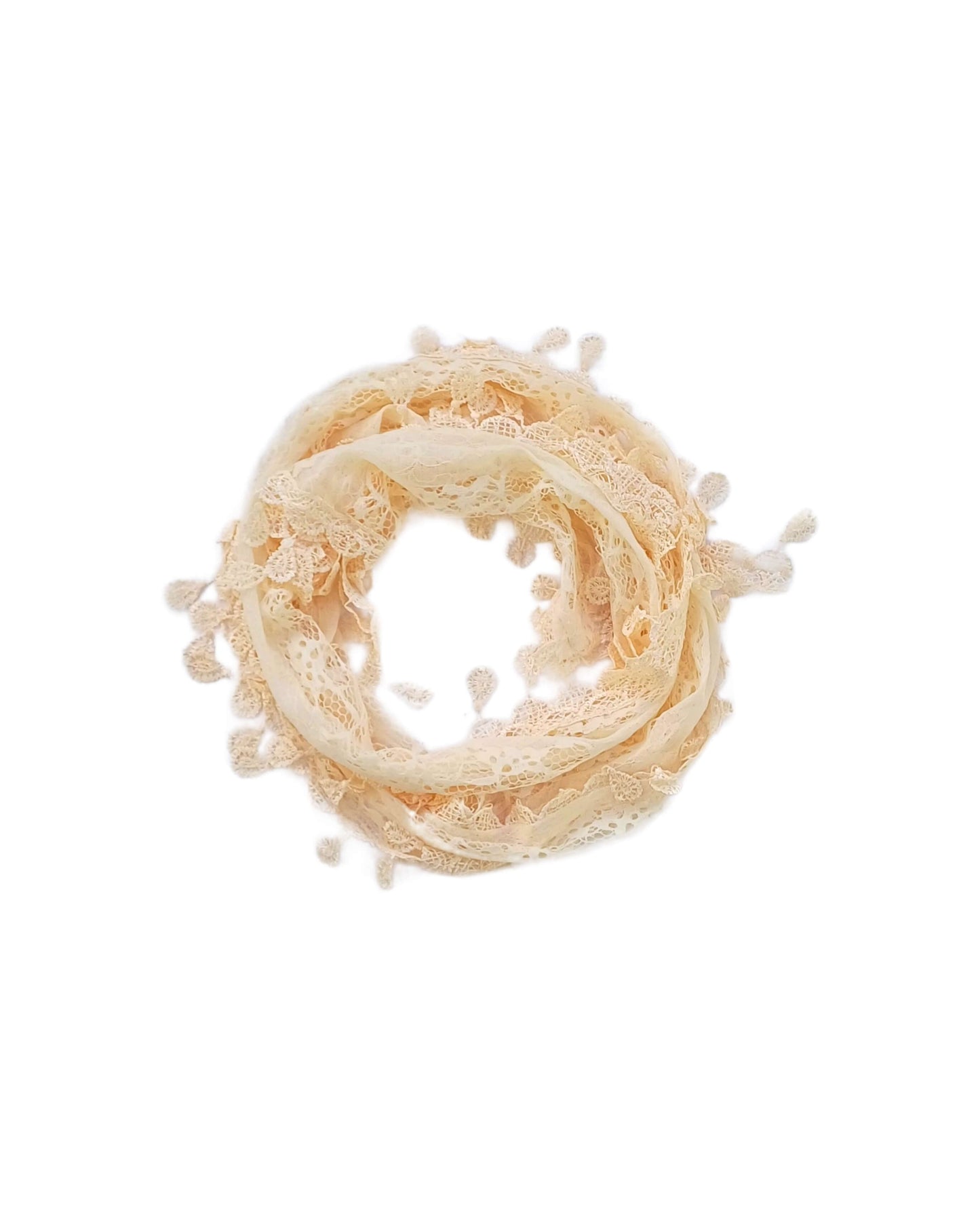 Aurora's Array: A soft cream-coloured scarf made of delicate lace with a leaf-like pattern and fringed edges, forming a circular shape.