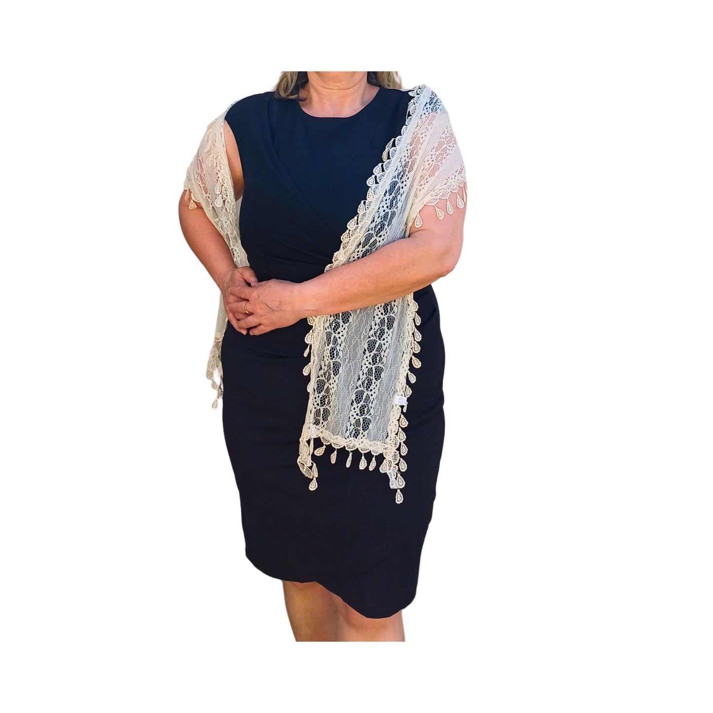 Aurora's Array: Woman models a soft cream-coloured lace scarf with a delicate leaf-like pattern and fringed edges.