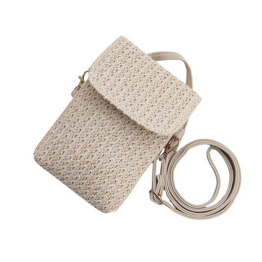 Aurora's Array: Close-up of a stylish, small crossbody bag made of woven natural material with a flap closure and adjustable strap.