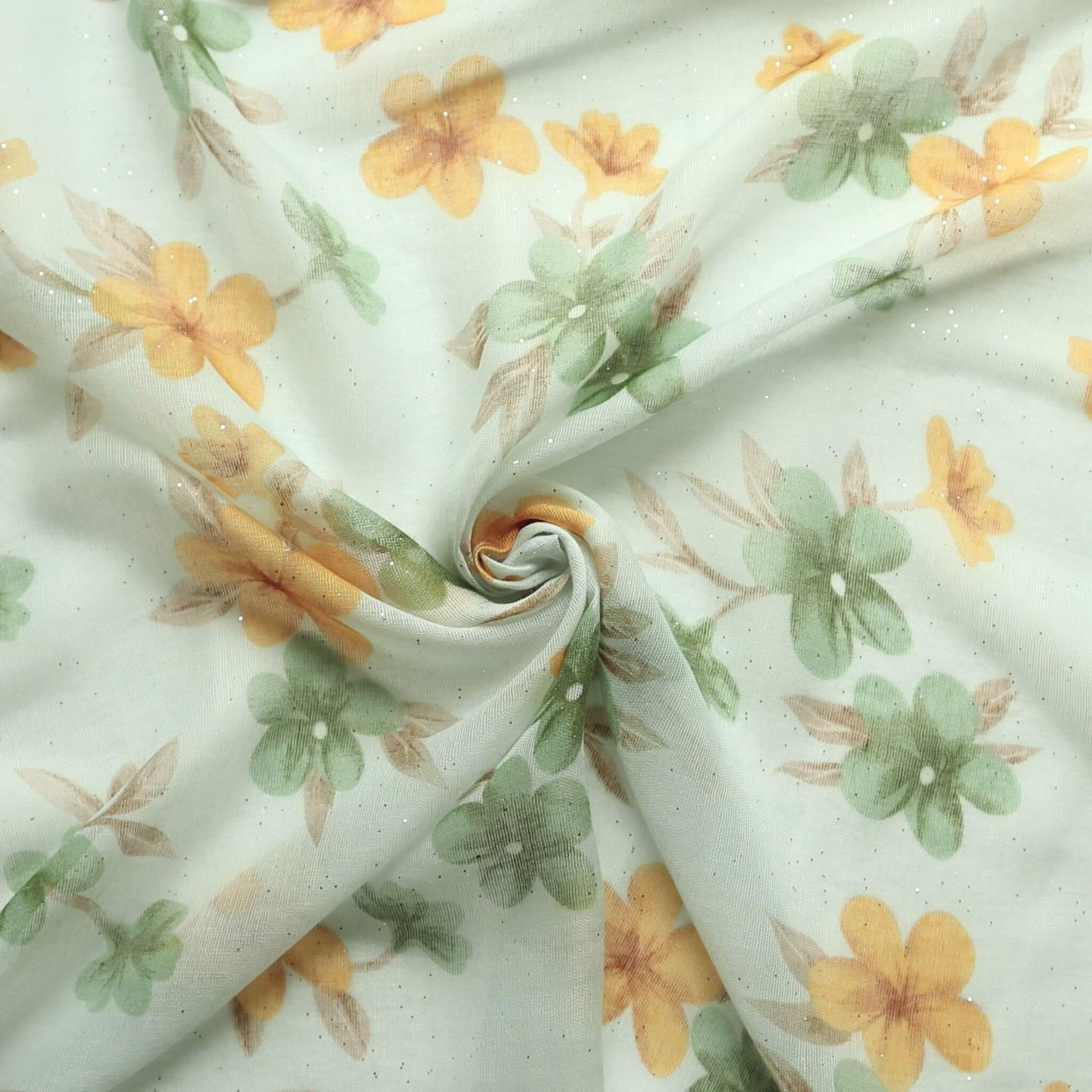 Aurora's Array: Close-up of a soft, lightweight green scarf with a yellow and green floral print, swirled to show detail.