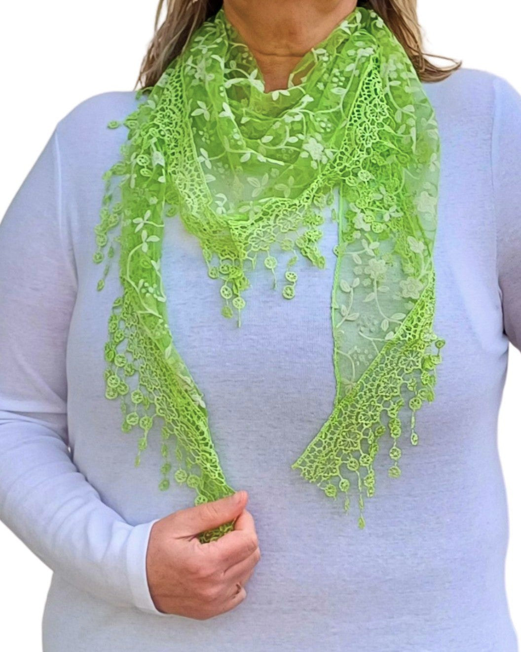 Aurora's Array Glitter Triangle Scarf with Lace & Embroidery: A woman models a bright green, sheer triangle scarf with a delicate white floral print, intricate lace trim, and dangling embroidered accents.
