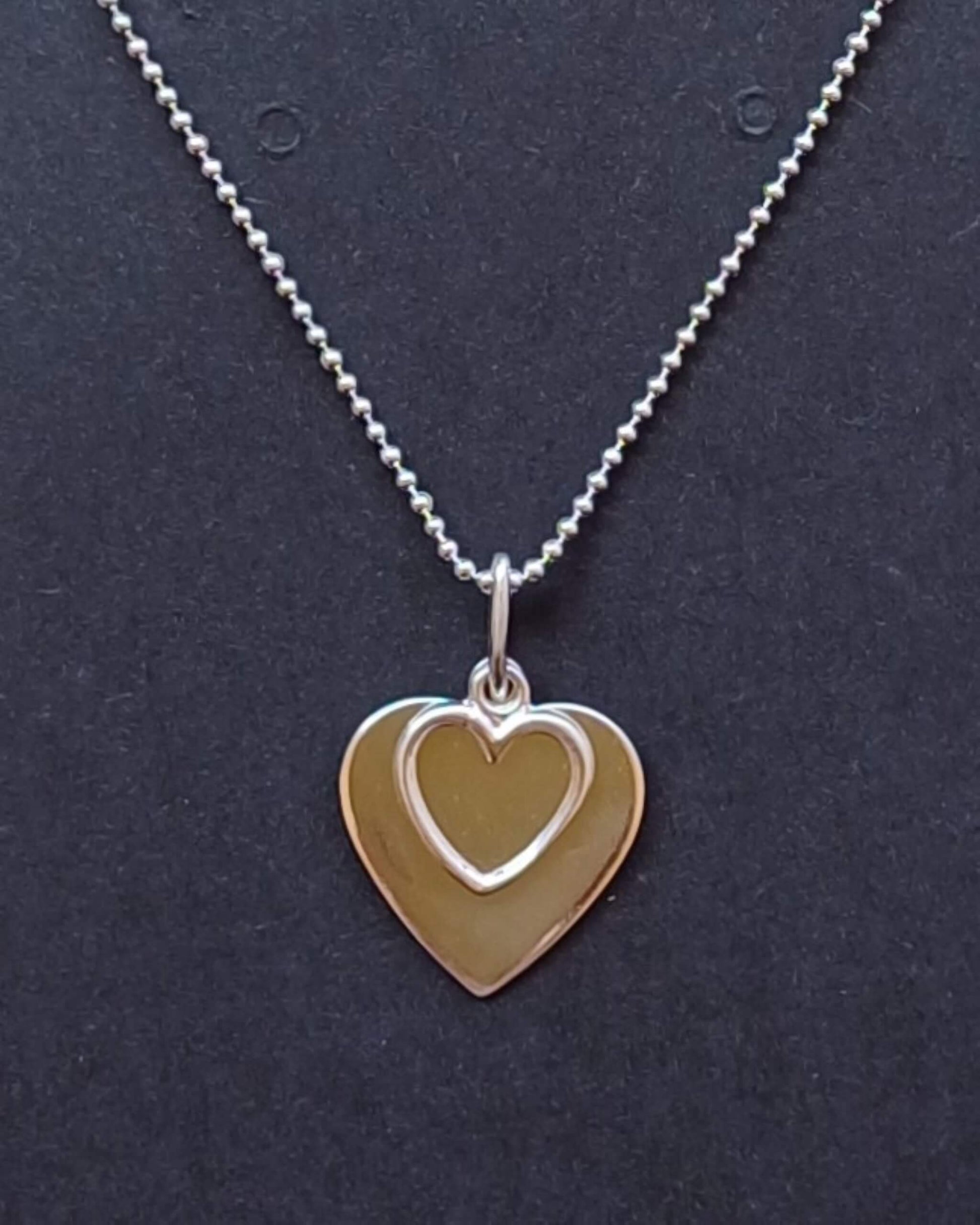 Delicate Sterling Silver Necklace with Double Heart Pendant - 925-sterling-silver-necklace-with-plain-and-outline-heart-pendant-Silver