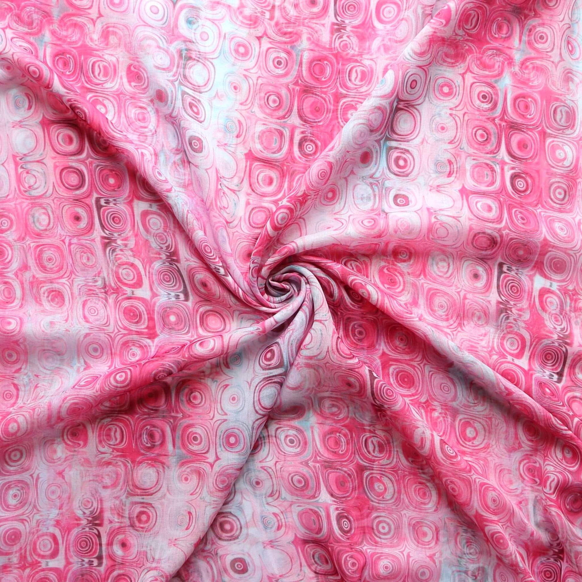 Bright pink scarf fabric with a retro-inspired geometric circle pattern in varying shades of pink and white. Lightweight textile.