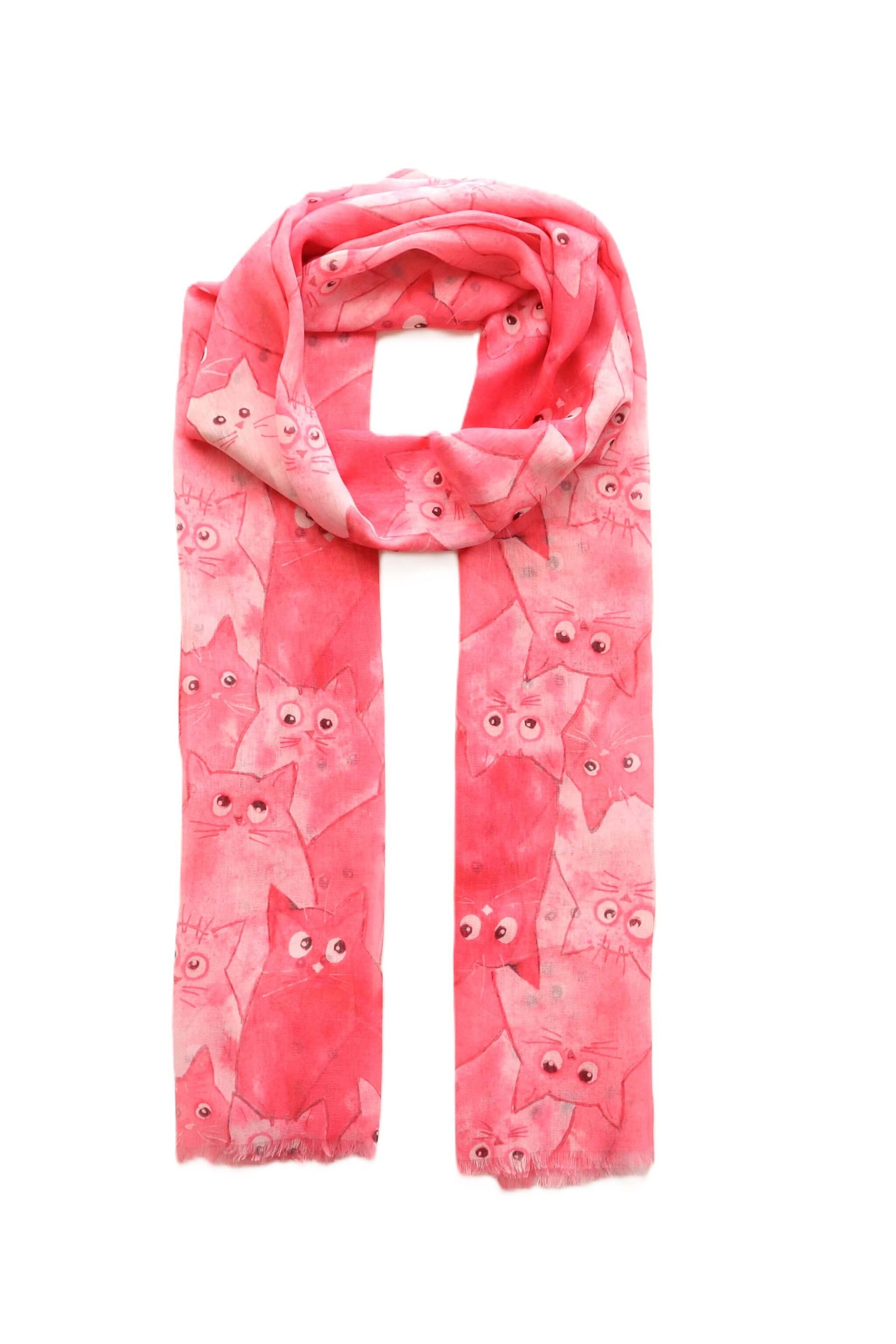 Lightweight pink scarf with a playful cartoon cat design in varying shades of pink and white. Stylish and soft accessory.