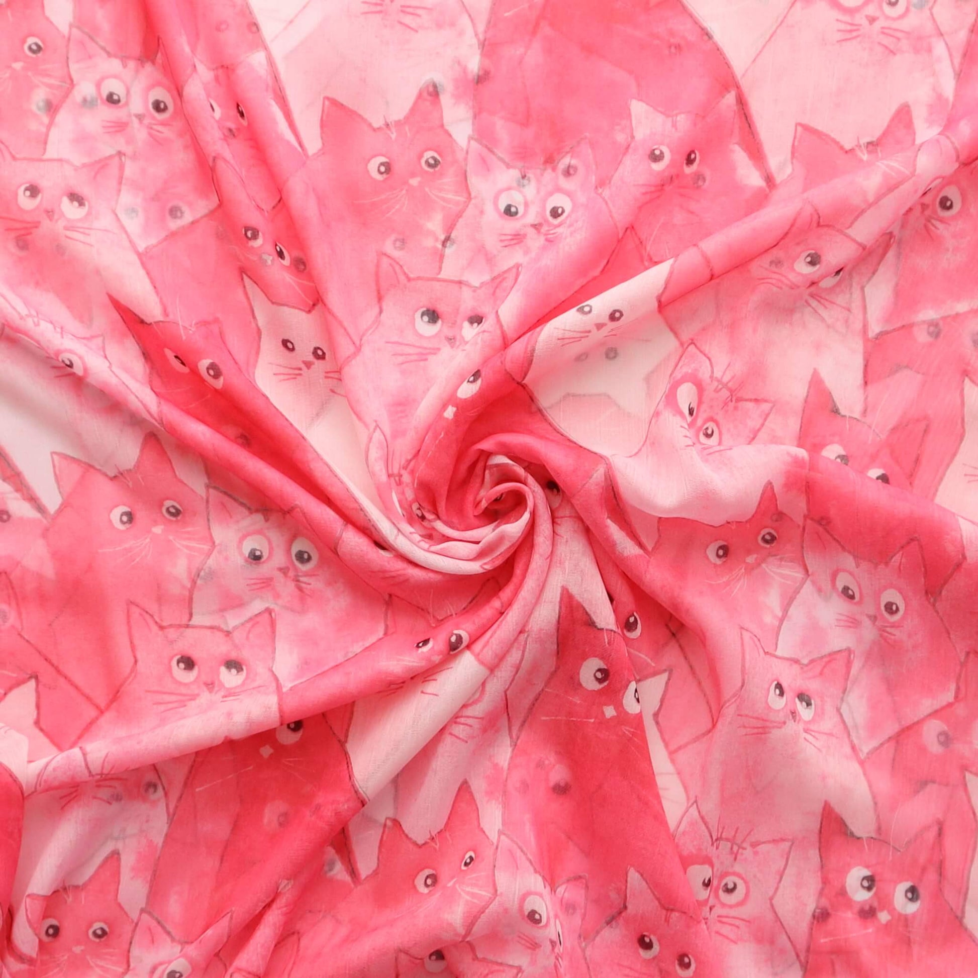 Pink scarf fabric with an all-over print of cute cartoon cats in varying shades of pink and white. Soft, lightweight material.