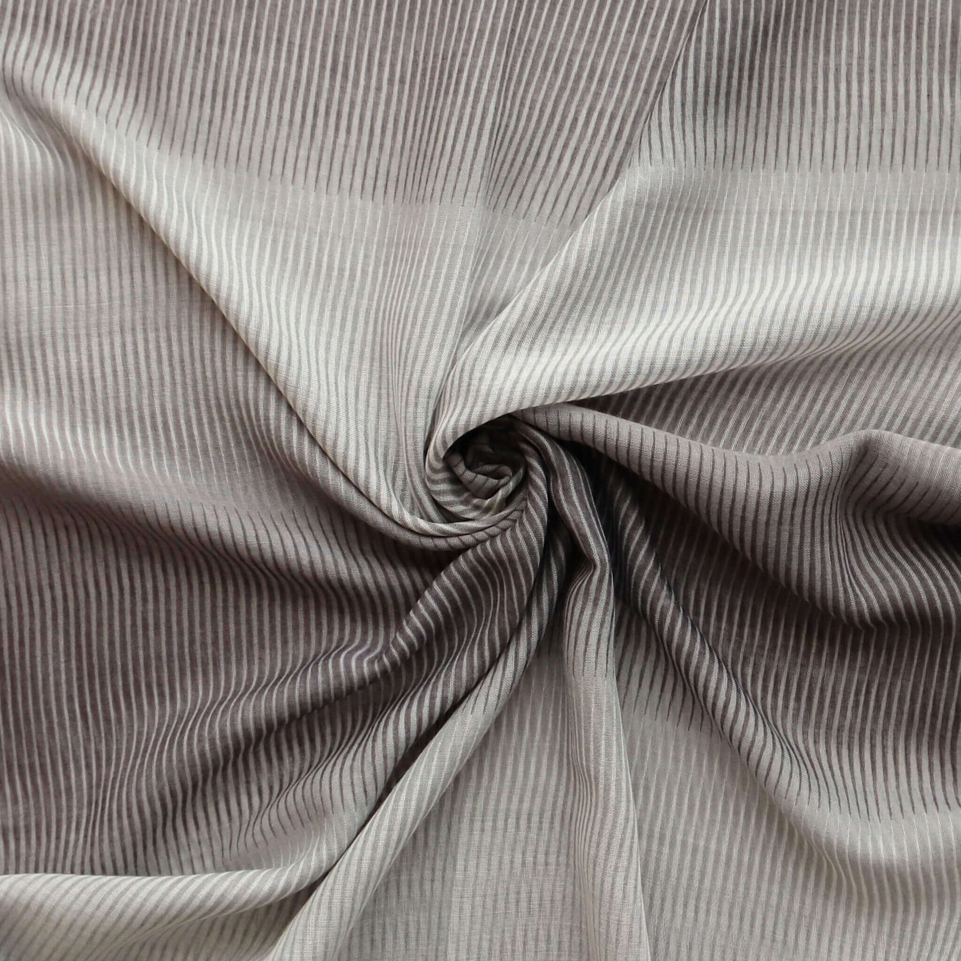 Softly draped scarf fabric with a subtle ombre effect from dark to light grey, featuring a fine, flowing stripe texture.