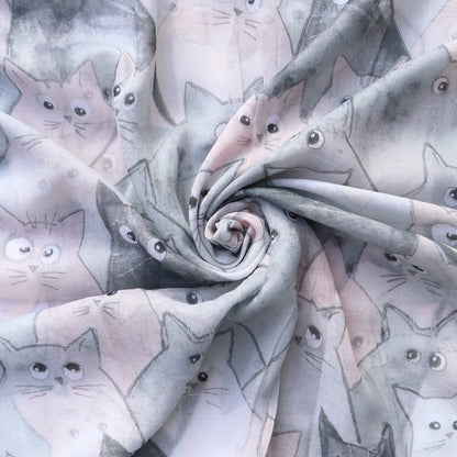 Lightweight scarf fabric with a charming cat pattern in shades of grey, blue, and soft pink. Stylish and comfortable material.