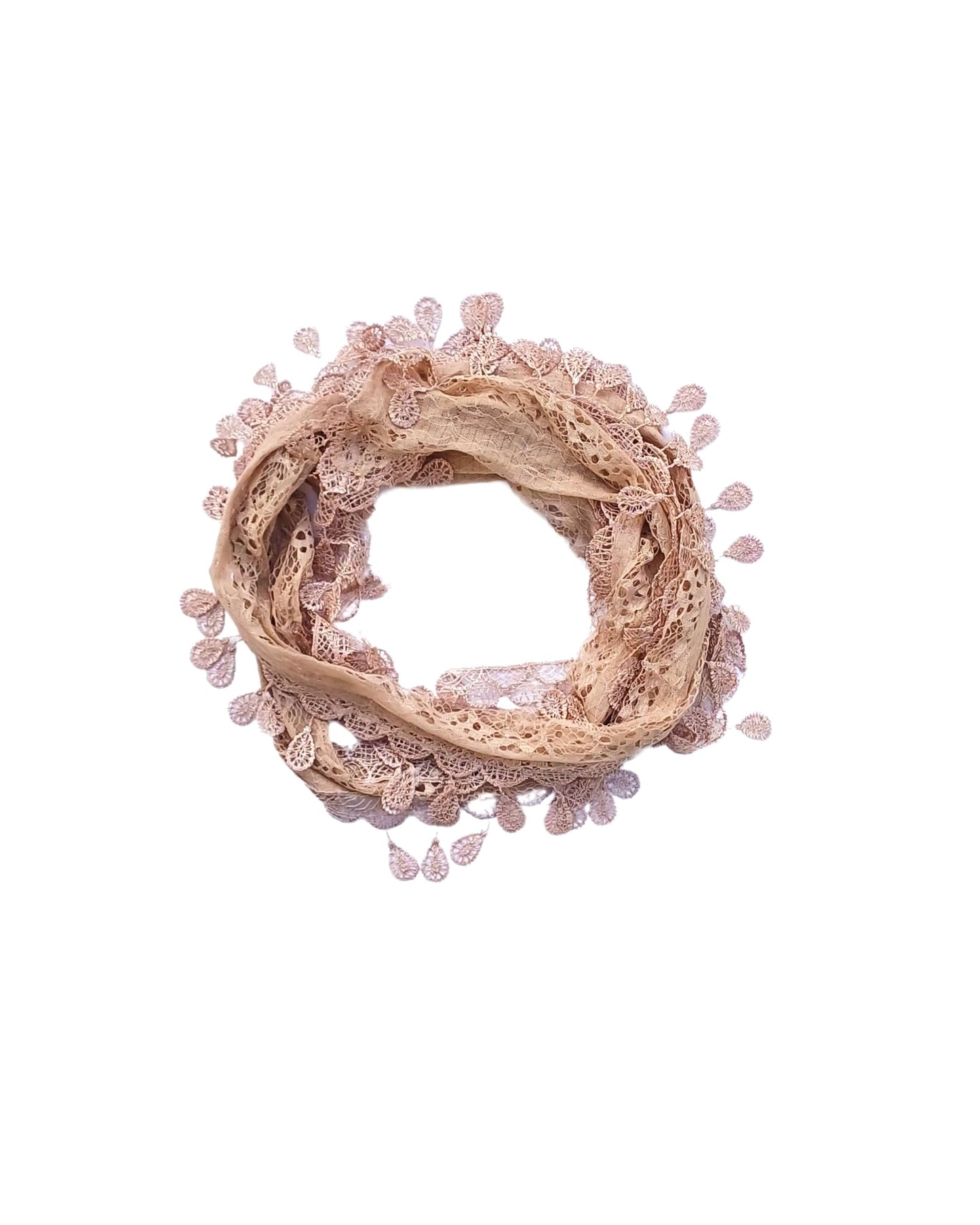Aurora's Array: A soft nude beige scarf made of delicate lace with a leaf-like pattern and fringed edges, forming a circular shape.