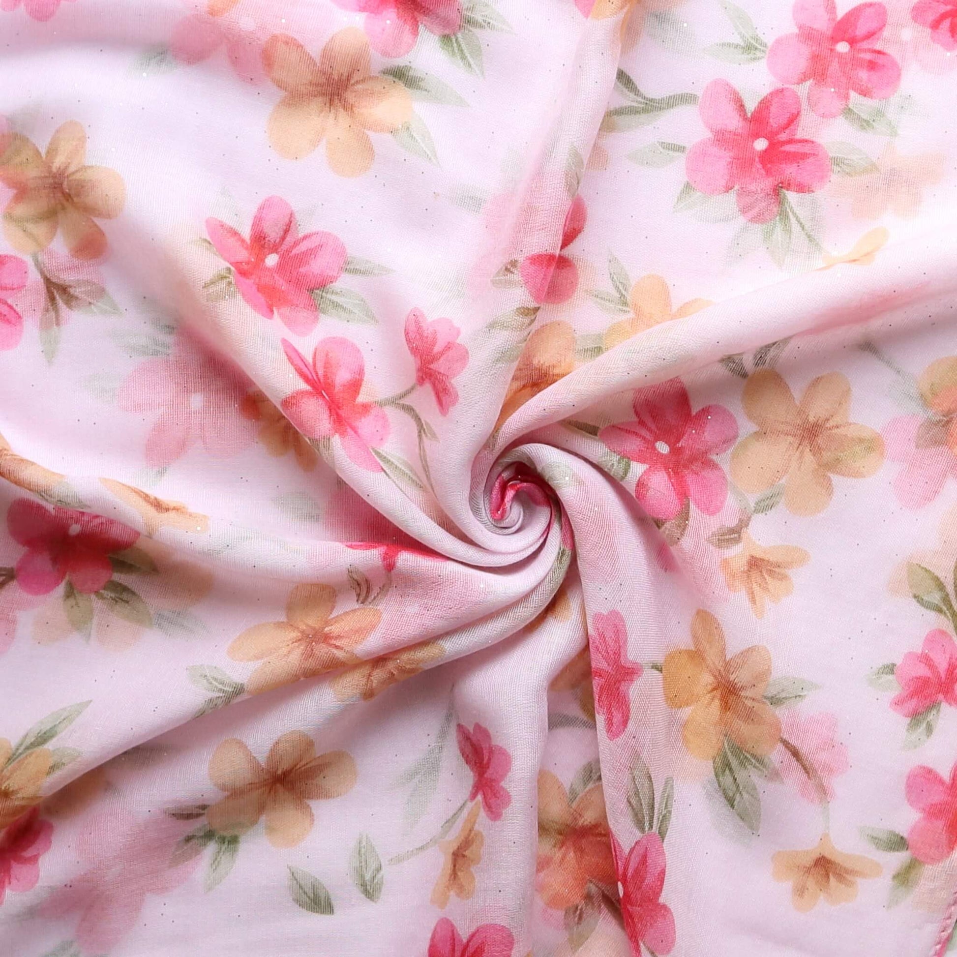 Aurora's Array: Close-up of a soft, lightweight light pink scarf with a pink and orange floral print, swirled to show detail.