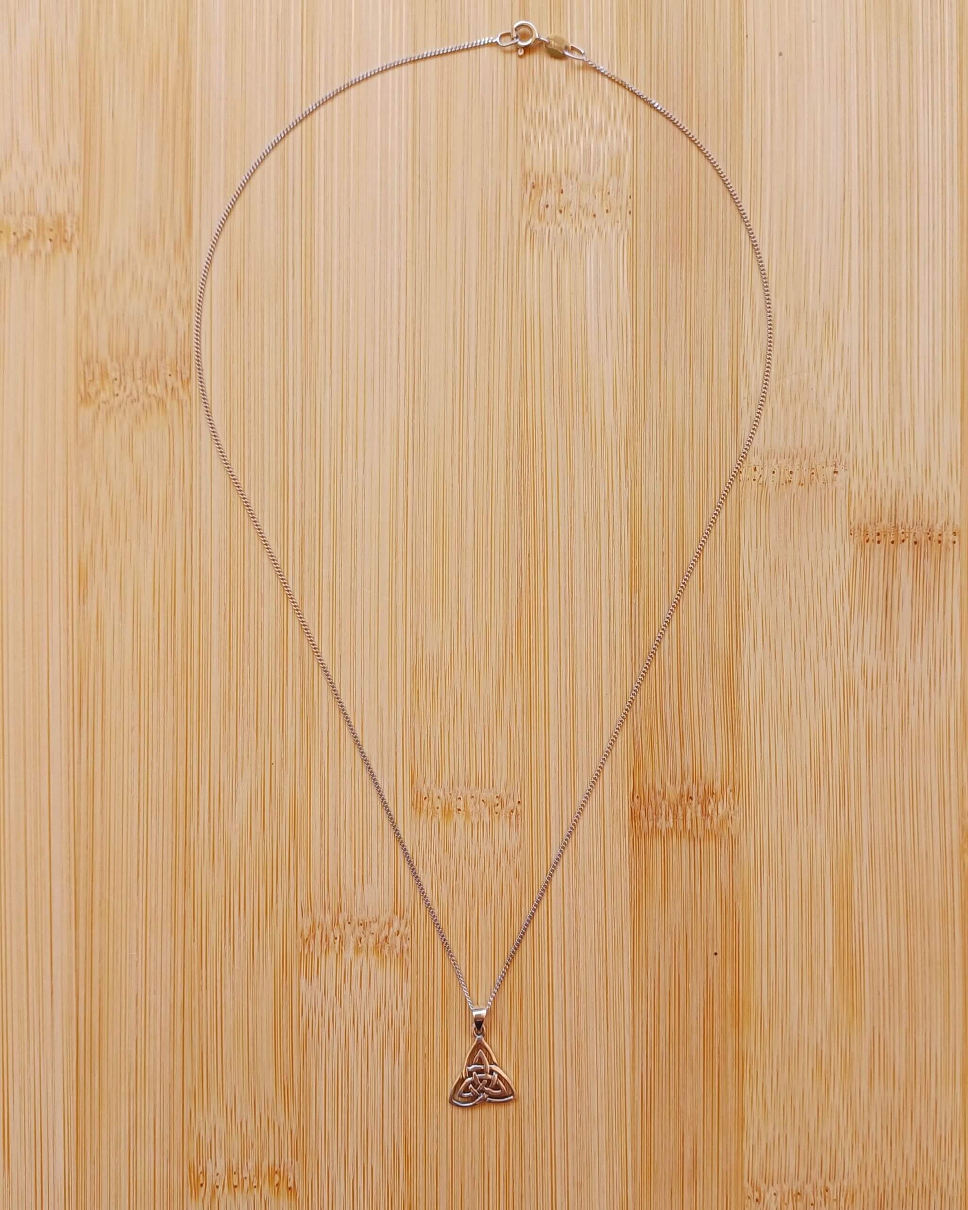 925 Silver Celtic Triangle Shape Pendant on an 18 inch Rhodium plated Sterling Silver curb chain. - 925-silver-celtic-triangle-shape-pendant-