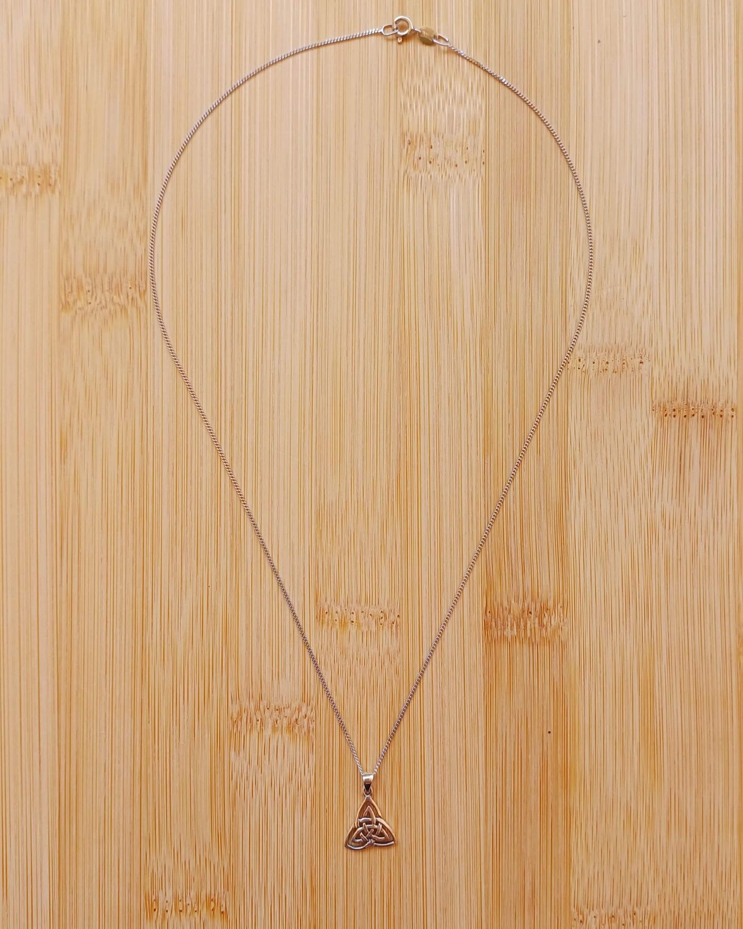 925 Silver Celtic Triangle Shape Pendant on an 18 inch Rhodium plated Sterling Silver curb chain. - 925-silver-celtic-triangle-shape-pendant-