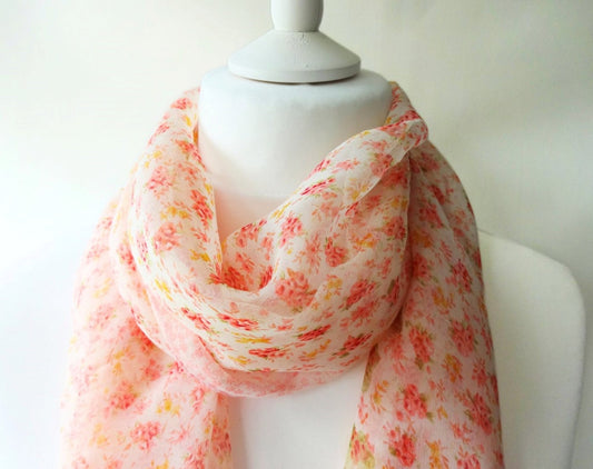 lightweight pink ditsy floral chiffon scarf on mannequin