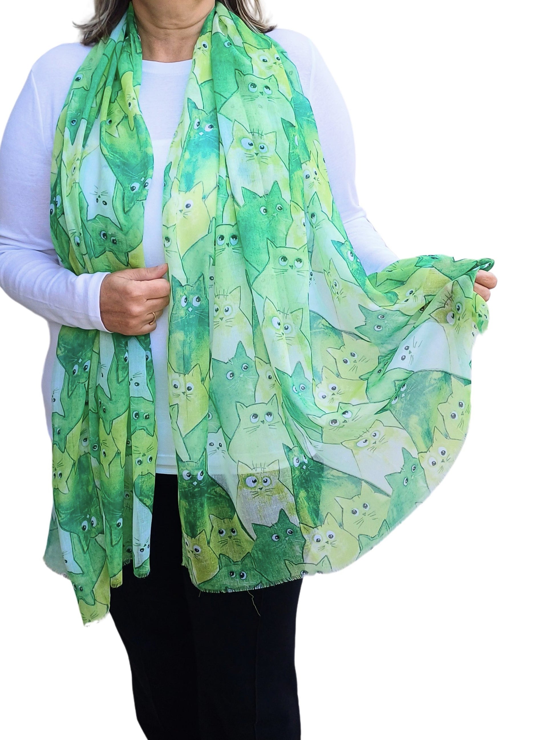 Green scarf with a charming all-over cat illustration pattern in various green and white tones. Soft, lightweight neckwear.