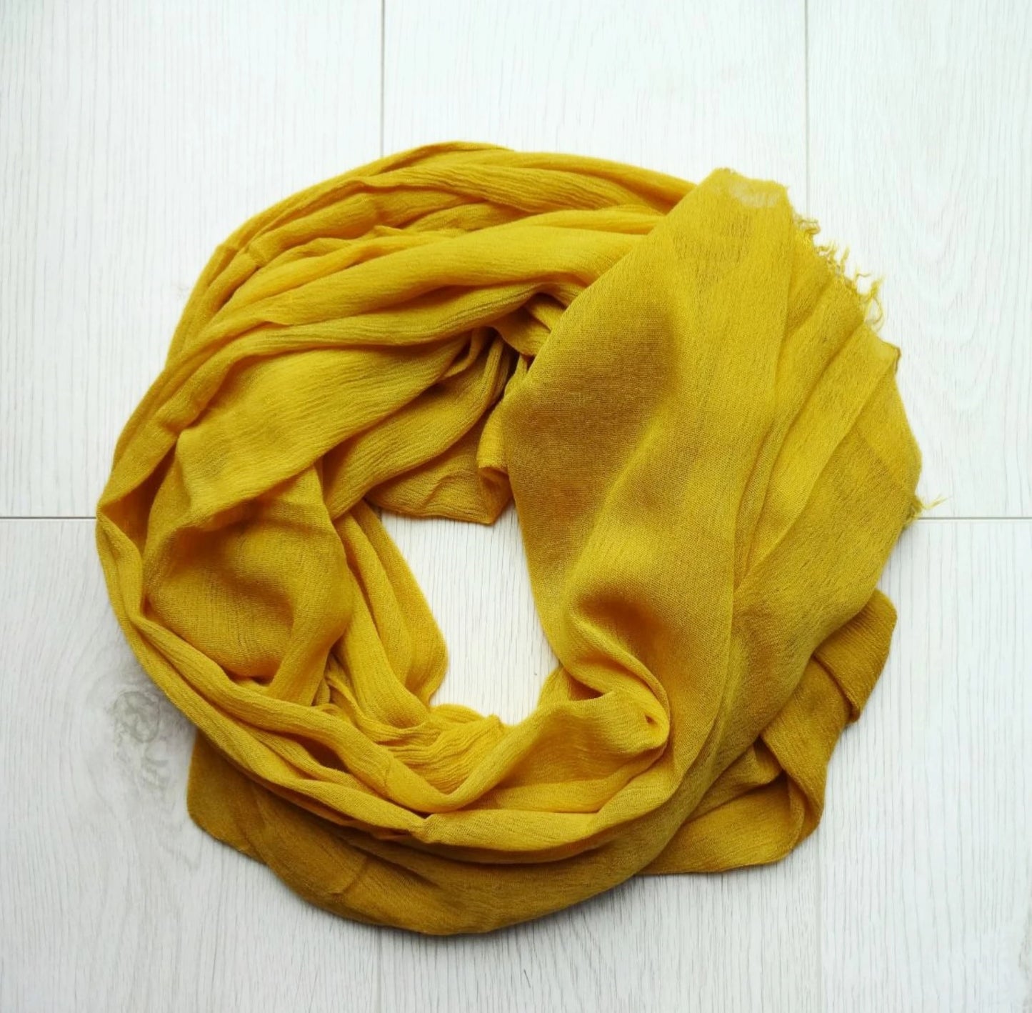 Lightweight oversized scarf wrap in mustard yellow