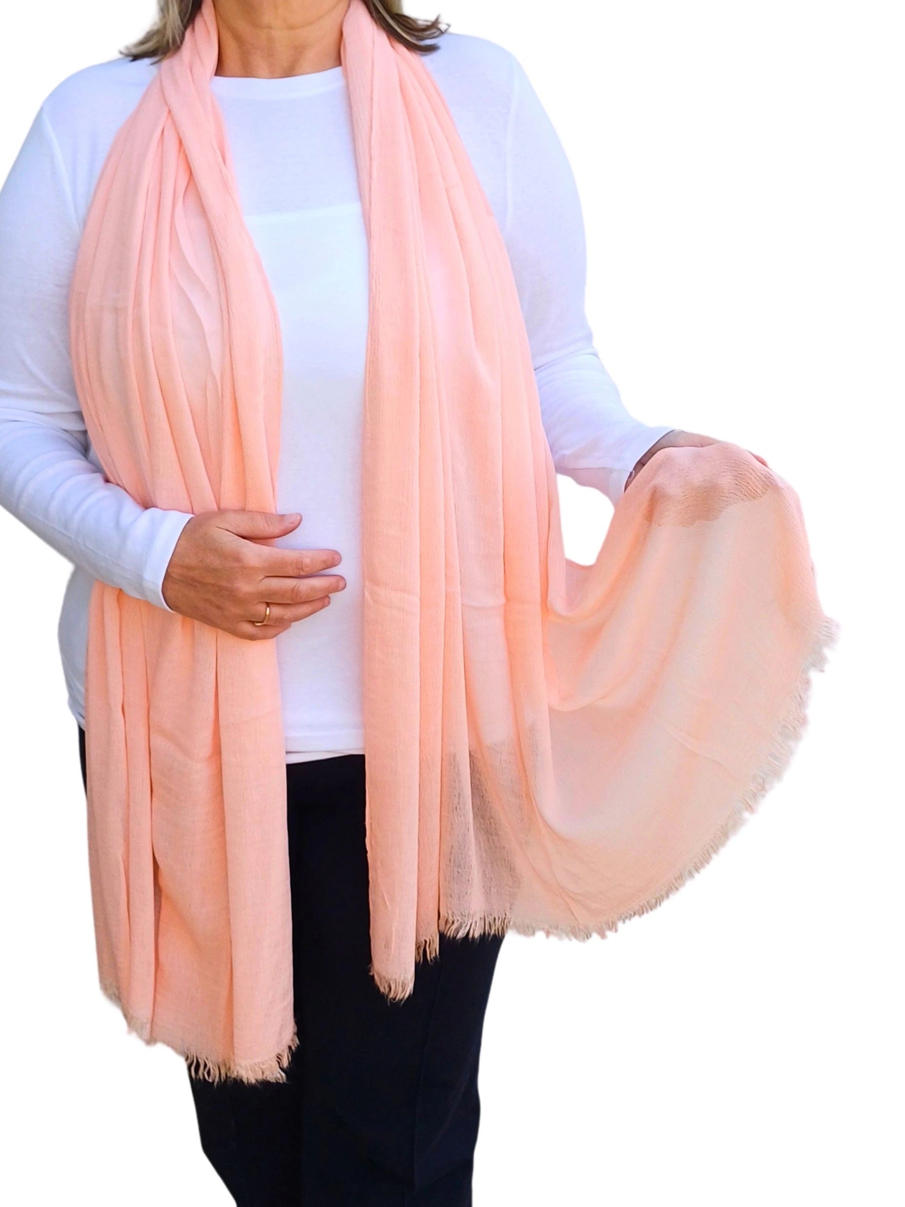Oversized lightweight scarf in salmon pink with frayed finish