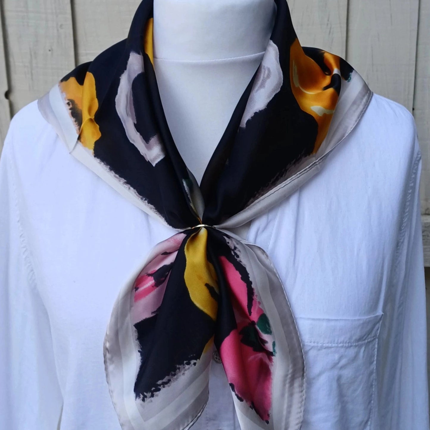 Black floral silky feel square scarf tied on mannequin