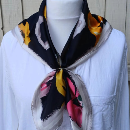 Black floral silky feel square scarf tied on mannequin