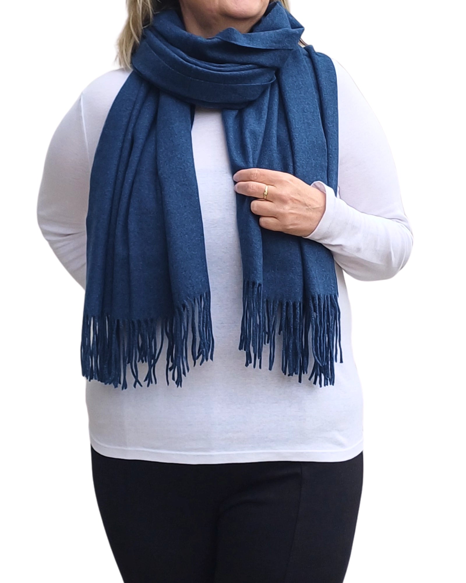 Navy cashmere blend winter scarf wrapped around shoulders, soft plain fabric, medium weight for warmth and style